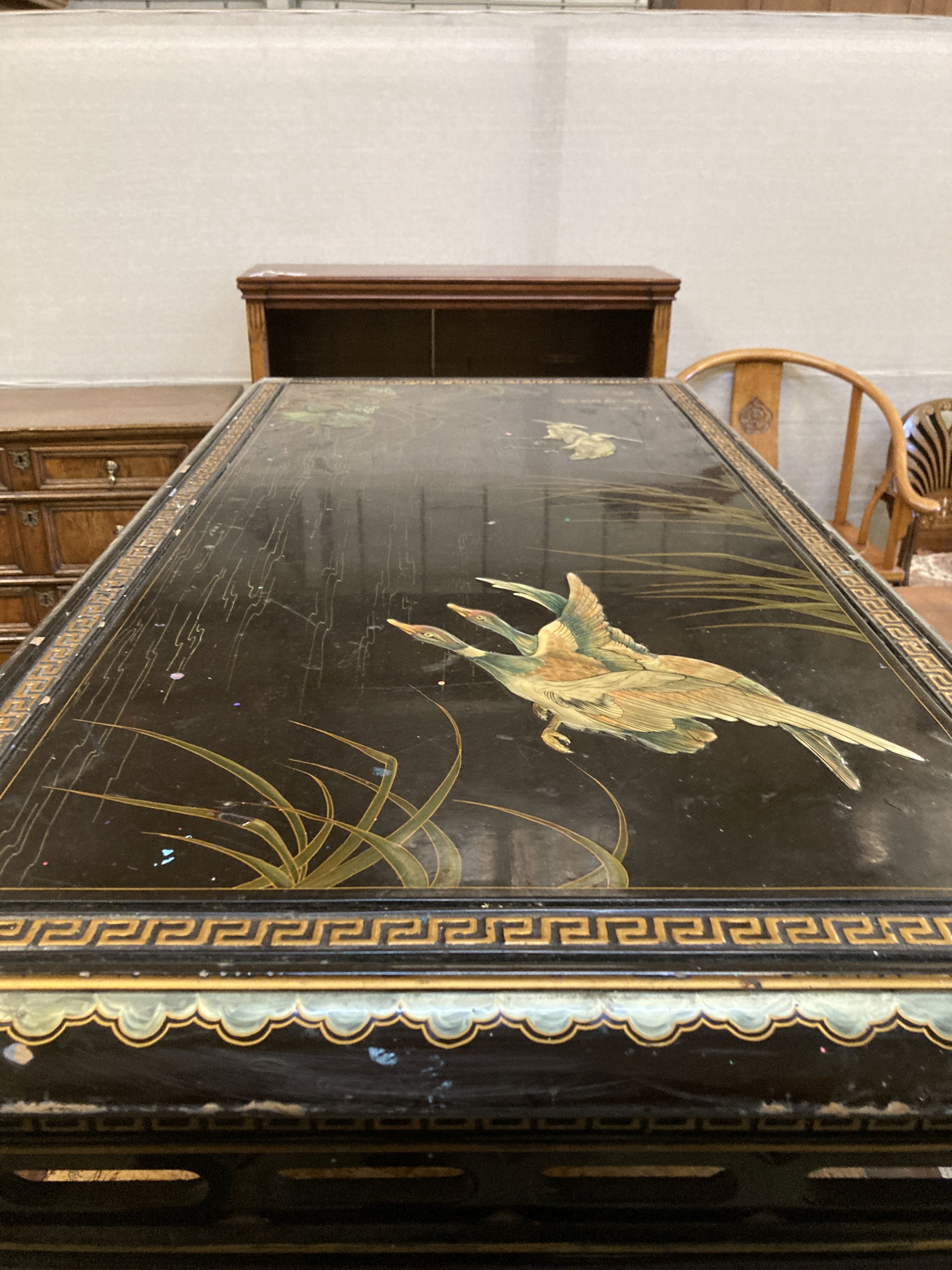 A rectangular Chinese lacquer coffee table, length 128cm, depth 69cm, height 44cm